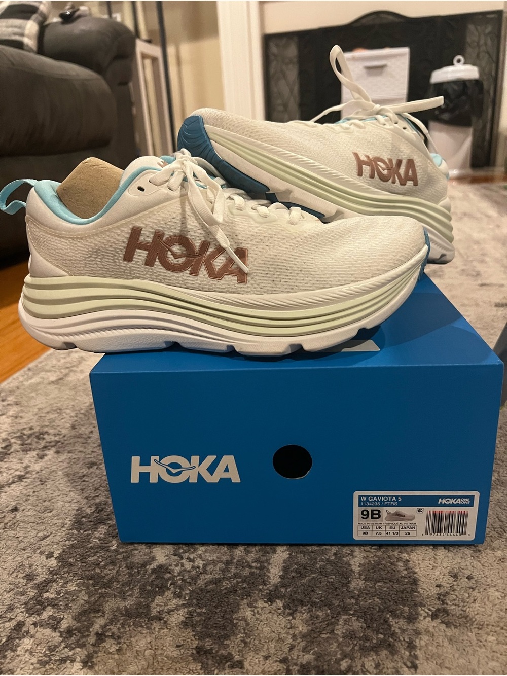 Hoka One One Women's Gaviota 5 Sneakers in Cream with Light Blue and Tan Logos